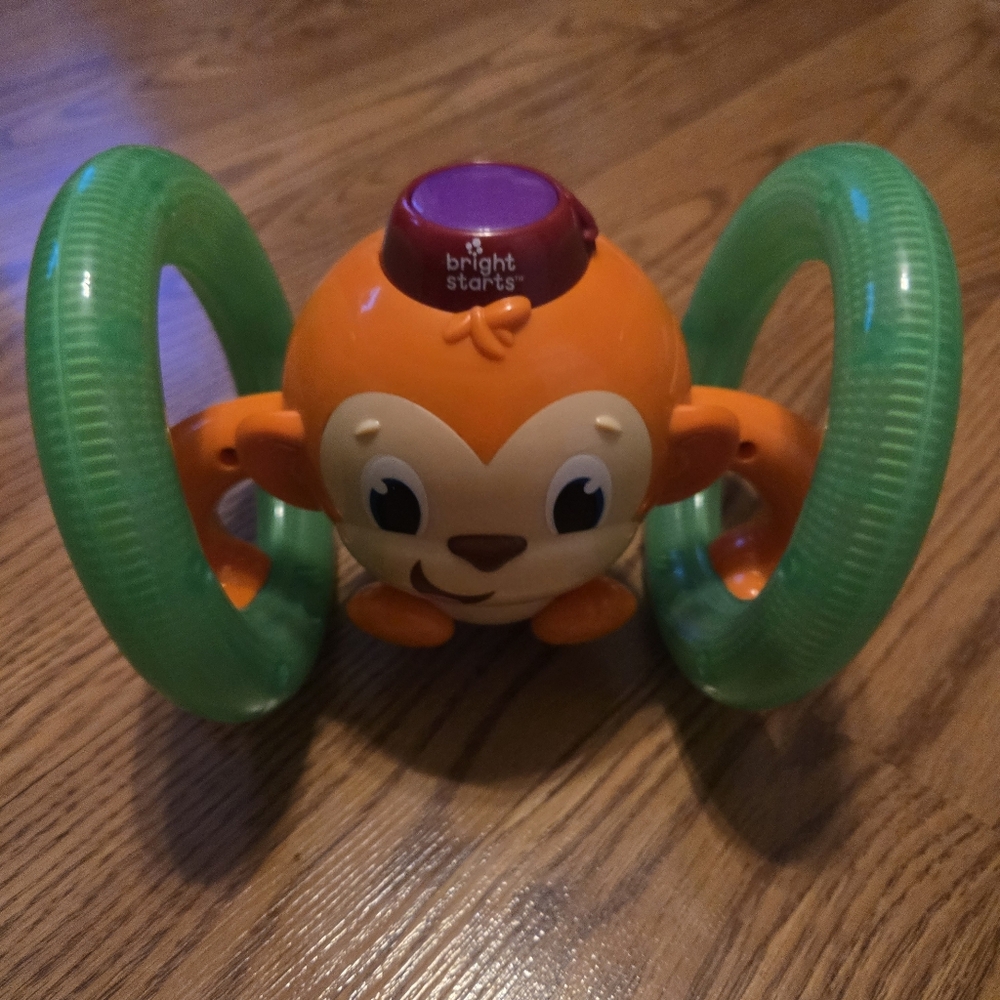 Bright Starts Roll & Glow Monkey  Colorful Rolls Sings Baby Infant Crawling Toy